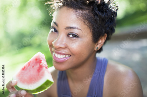 Photo: Black woman eating watermelon Black woman eating watermelon
