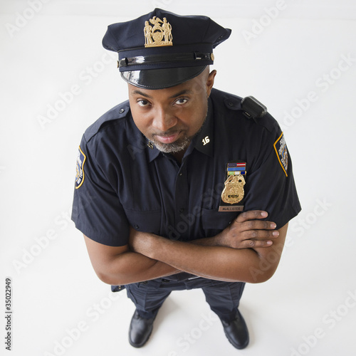 Photo: African American policeman with arms crossed African American policeman with arms crossed