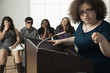 Teenage girl giving speech to classmates