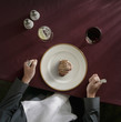 Caucasian woman about to eat portion of meat