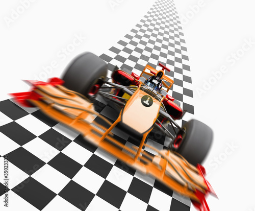 Photo: Orange race car driving on checkerboard road Orange race car driving on checkerboard road