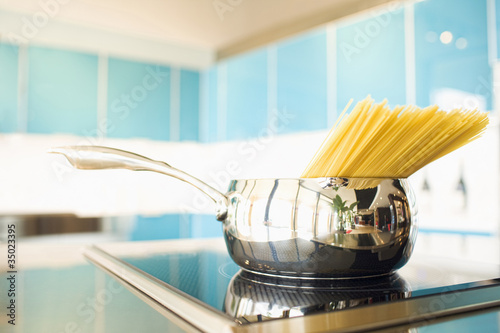 Photo: Pasta in pot on stove Pasta in pot on stove