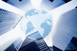 Foto: Large blue globe over highrise buildings Large blue globe over highrise buildings