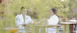 Couple enjoying breakfast on outdoor patio