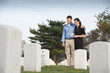 Couple visiting cemetery together