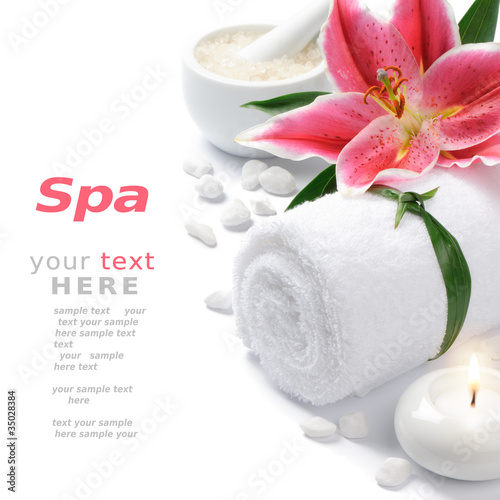 Photo: Spa setting with lily flower Spa setting with lily flower
