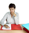 Older woman working at desk, administration