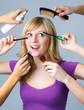 Blonde woman doing makeup