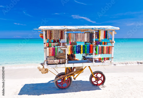 Photo: Cart selling typical souvenirs on cuban beach of Varadero Cart selling typical souvenirs on cuban beach of Varadero