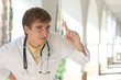 Young doctor with a thumb up