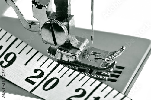 Photo: Macro shot of a sewing machine Macro shot of a sewing machine