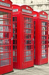 London phone booths with a desaturated background London phone booths with a desaturated background
