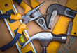 Set of tools over a wood panel
