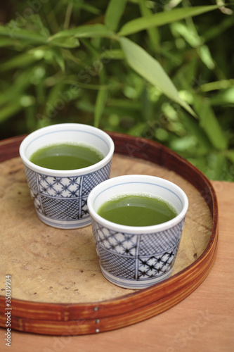 Photo: Close up of green tea in teacups Close up of green tea in teacups