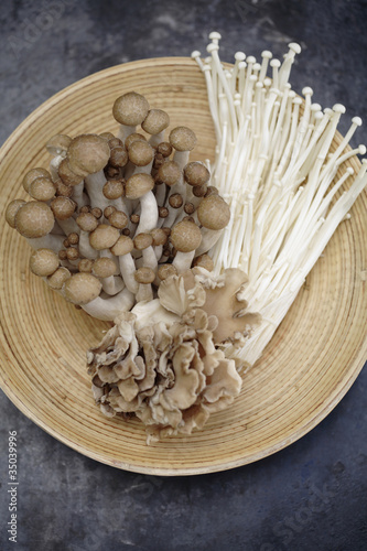 Photo: Variety of Asian mushrooms in basket Variety of Asian mushrooms in basket