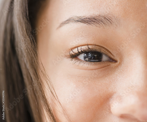 Photo: Close up of mixed race teenage girl's eye Close up of mixed race teenage girl's eye