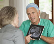Doctor explaining medical cross-section to patient