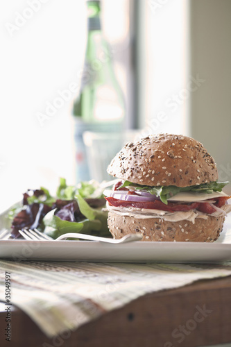 Photo: Sandwich and salad on plate Sandwich and salad on plate