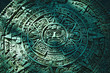 Foto: Green Aztec calendar stone carving Green Aztec calendar stone carving