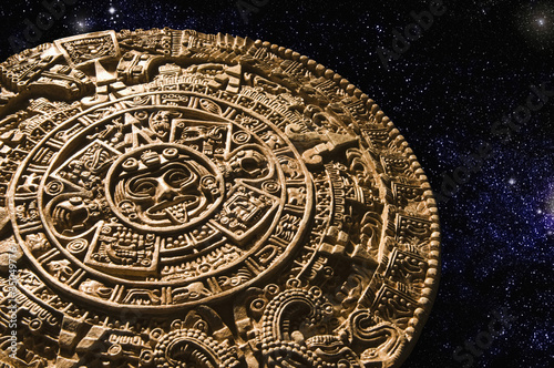 Photo: Aztec calendar stone carving in space Aztec calendar stone carving in space