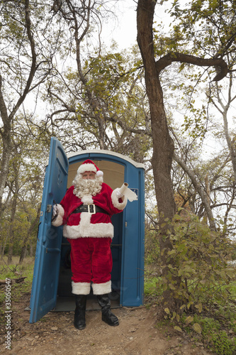 Photo: Santa leaving portable toilet Santa leaving portable toilet