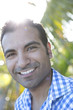 Smiling Hispanic man