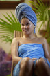 Chinese woman with head in towel