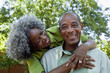 African American couple hugging