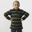Angry Caucasian boy with hands on hips