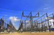high-voltage substation on blue sky background with switch