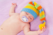 sleeping baby with pacifier