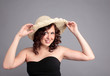 A woman with a hat