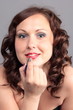 A woman with a  lipstick