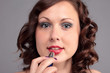 A woman with a  lipstick