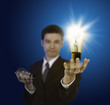 business man holding light bulb ,thinking of new idea