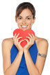 Young female in peeking from the heart shape