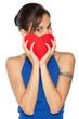 Young  female peeking from the heart shape