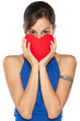 Young female peeking from the heart shape