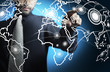 Business man touching world map screen