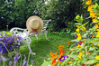 Peacuful summer garden with a hat Peacuful summer garden with a hat