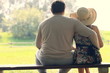 Couple in love sitting in the park