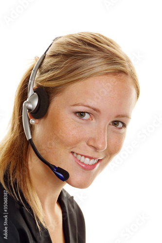 Photo: Frau mit Headset im Kundenservice Frau mit Headset im Kundenservice
