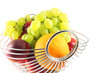 The metal basket with fruit The metal basket with fruit