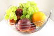 The metal basket with fruit The metal basket with fruit