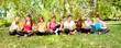 group of young students  in park