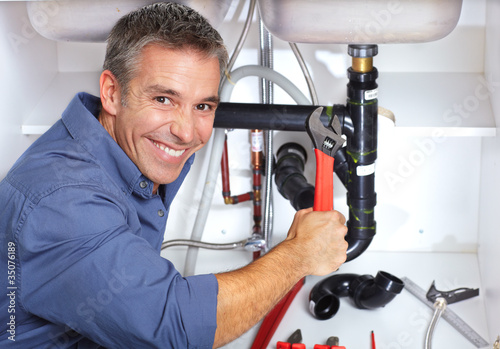 Photo: Plumber. Plumber.