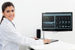 Photo: Dentist Looking at X-rays Dentist Looking at X-rays