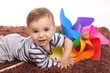 beautiful and happy baby with wind mill beautiful and happy baby with wind mill