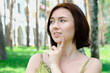 Girl at the countryside in a thingking pose