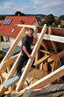carpenters constructing a dormer